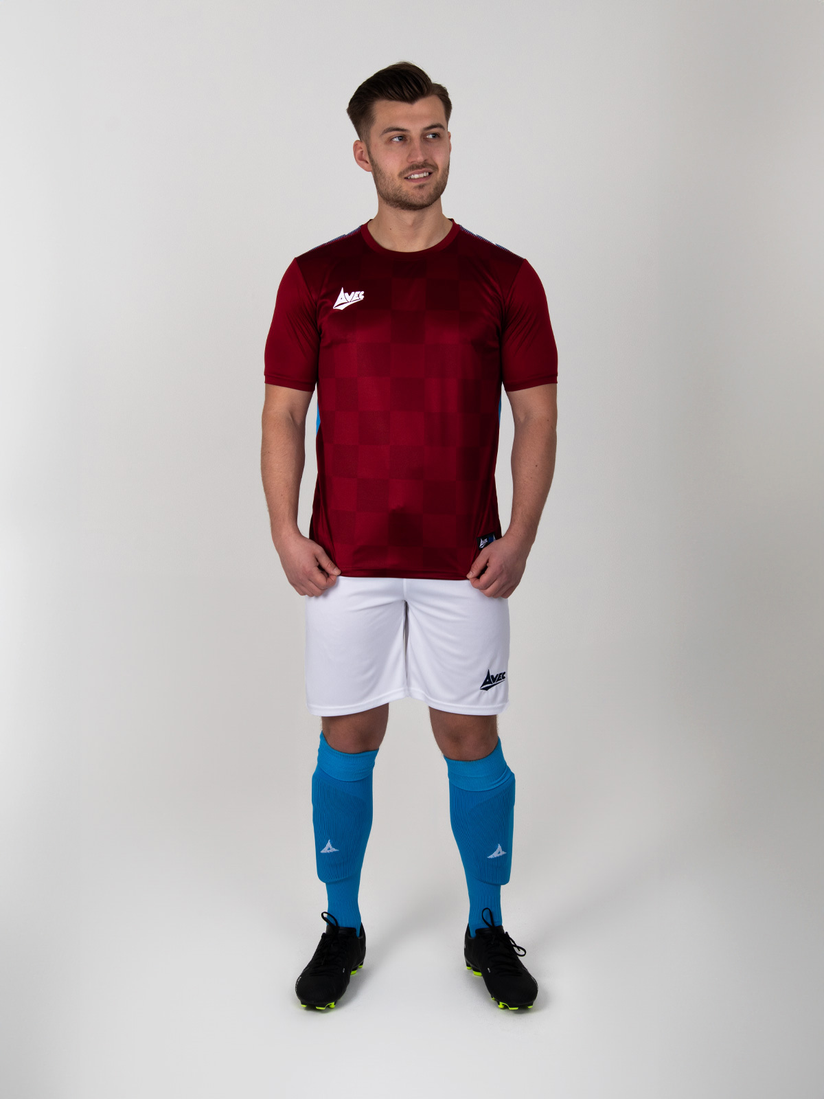 a west ham kit style combination of claret shirt, white shorts and sky blue socks